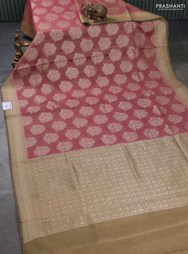 Banarasi tissue silk cotton saree pastel peach shade and elaichi green with allover thread & zari woven butta weaves and woven border