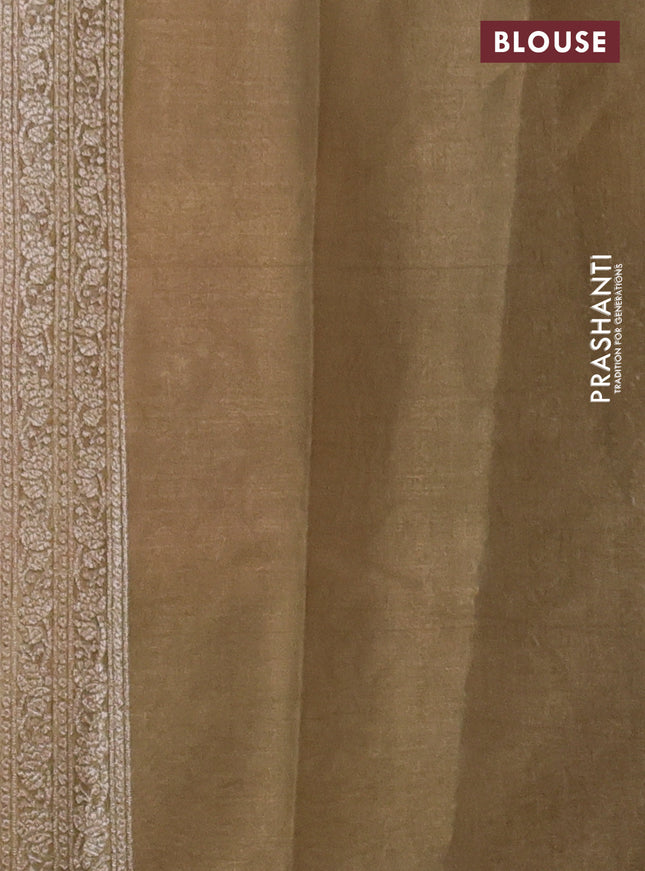 Banarasi tissue silk cotton saree pastel peach shade and elaichi green with allover thread & zari woven butta weaves and woven border