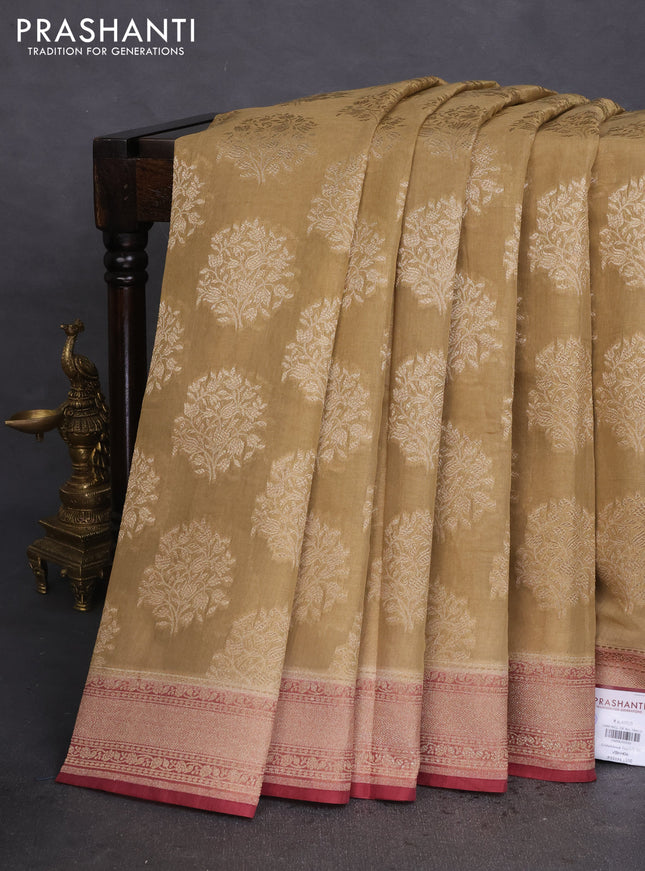 Banarasi tissue silk cotton saree sandal and pastel maroon with allover thread & zari woven butta weaves and woven border