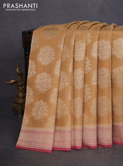 Banarasi tissue silk cotton saree sandal and pastel maroon with allover thread & zari woven butta weaves and woven border