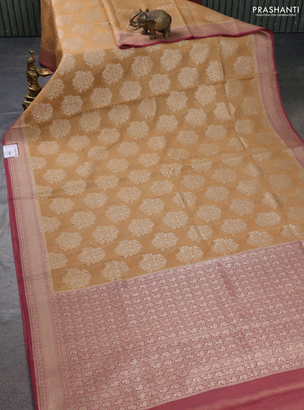 Banarasi tissue silk cotton saree sandal and pastel maroon with allover thread & zari woven butta weaves and woven border