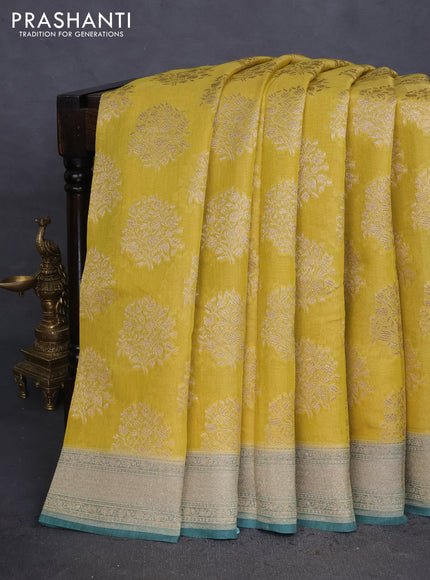 Banarasi tissue silk cotton saree mustard yellow and pastel green with allover thread & zari woven butta weaves and woven border