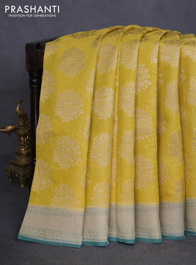 Banarasi tissue silk cotton saree mustard yellow and pastel green with allover thread & zari woven butta weaves and woven border