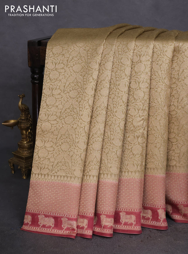 Banarasi silk cotton saree elaichi green and maroon shade with allover zari woven brocade weaves and woven border