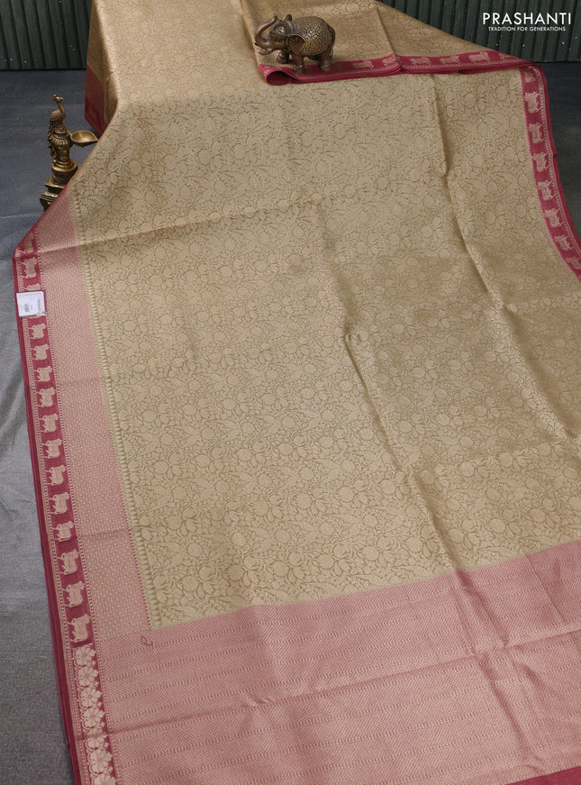 Banarasi silk cotton saree elaichi green and maroon shade with allover zari woven brocade weaves and woven border