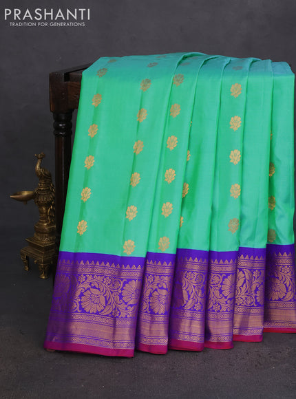 Pure gadwal silk saree dual shade of teal green and blue with zari woven buttas and zari woven border
