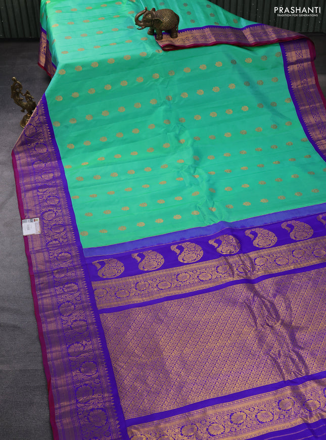 Pure gadwal silk saree dual shade of teal green and blue with zari woven buttas and zari woven border