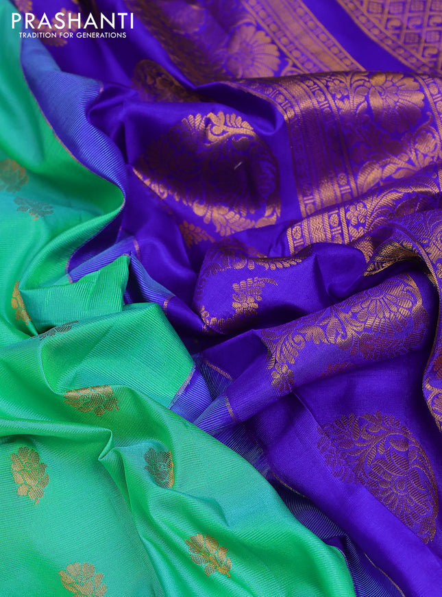 Pure gadwal silk saree dual shade of teal green and blue with zari woven buttas and zari woven border