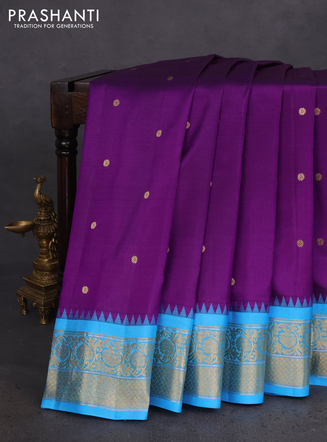 Pure gadwal silk saree deep purple and cs blue with zari woven buttas and temple design zari woven border