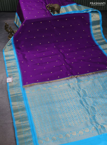 Pure gadwal silk saree deep purple and cs blue with zari woven buttas and temple design zari woven border