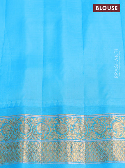 Pure gadwal silk saree deep purple and cs blue with zari woven buttas and temple design zari woven border