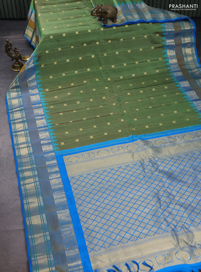 Pure gadwal silk saree green shade and cs blue with zari woven buttas and rettapet annam zari woven border