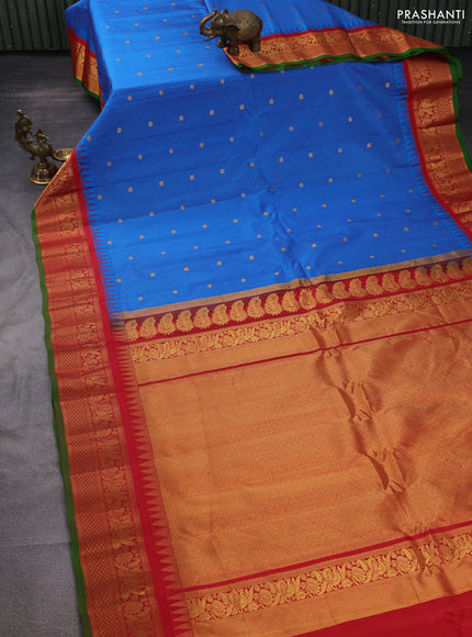 Pure gadwal silk saree cs blue and red with allover small checks & zari buttas and temple design zari woven border