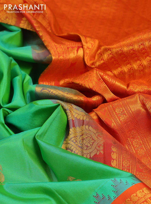Pure gadwal silk saree light green and orange with annam zari woven buttas and temple design zari woven border