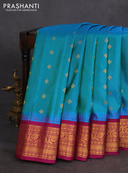 Pure gadwal silk saree dual shade of teal blue and purple with zari woven buttas and temple design zari woven border