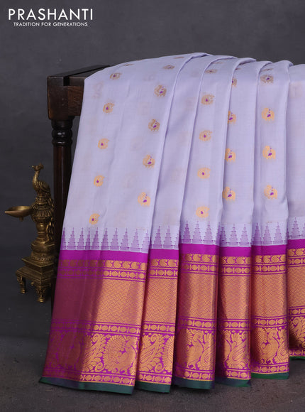 Pure gadwal silk saree bluish grey and purple with annam zari woven buttas and temple design zari woven border