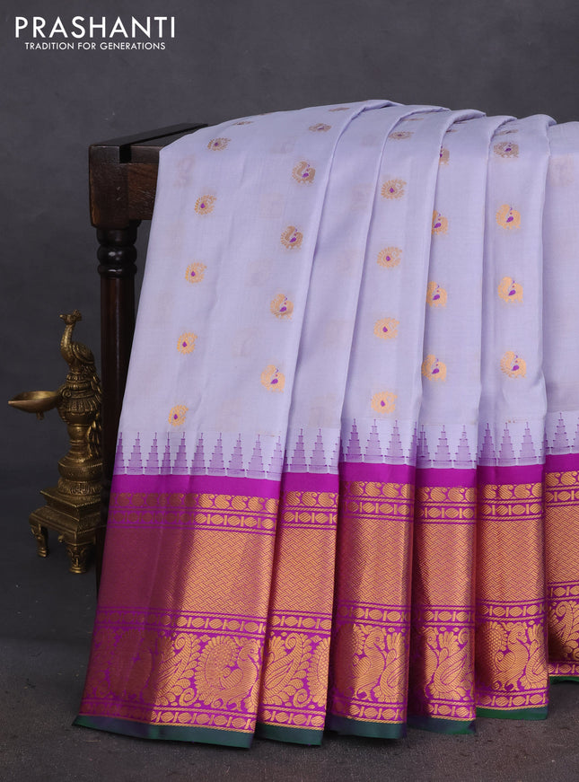 Pure gadwal silk saree bluish grey and purple with annam zari woven buttas and temple design zari woven border