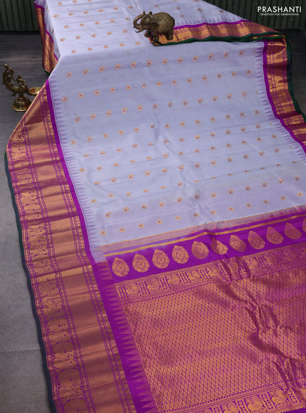Pure gadwal silk saree bluish grey and purple with annam zari woven buttas and temple design zari woven border