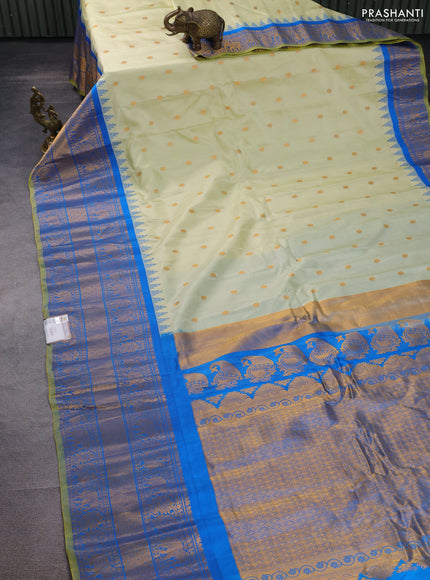 Pure gadwal silk saree pista green and cs blue with zari woven buttas and long zari woven border