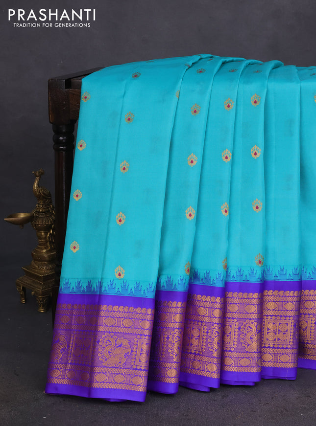 Pure gadwal silk saree teal blue and blue with zari woven buttas and temple design zari woven border