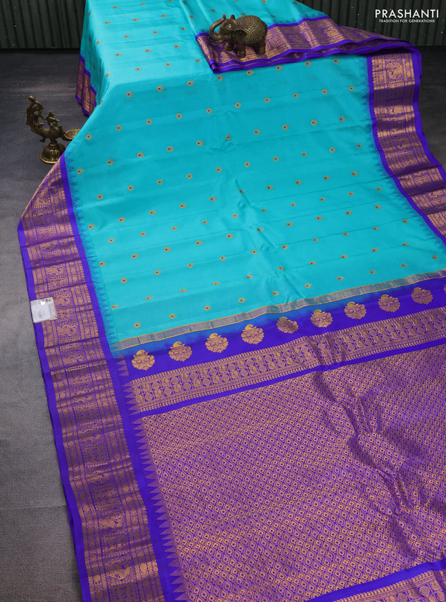 Pure gadwal silk saree teal blue and blue with zari woven buttas and temple design zari woven border