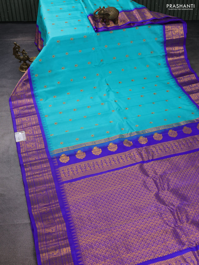 Pure gadwal silk saree teal blue and blue with zari woven buttas and temple design zari woven border
