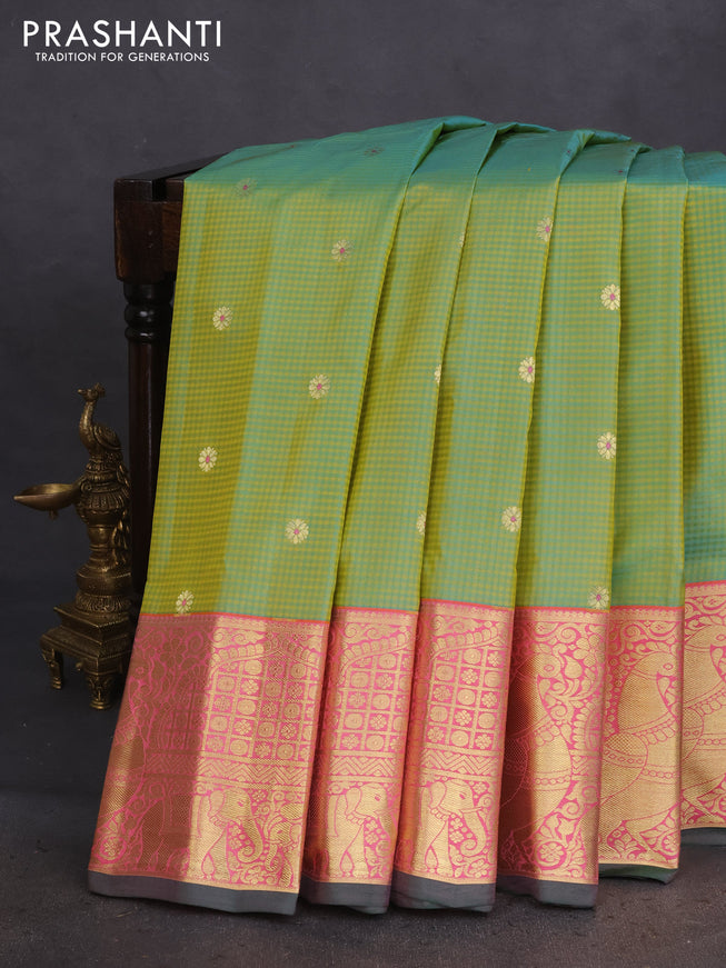 Pure gadwal silk saree light green and peach pink with allover small checked pattern & zari buttas and annam zari woven border