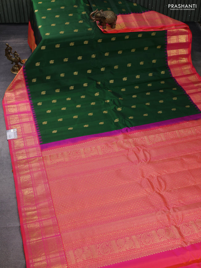 Pure gadwal silk saree green and dual shade of pinkish orange with zari woven buttas and temple design zari woven border