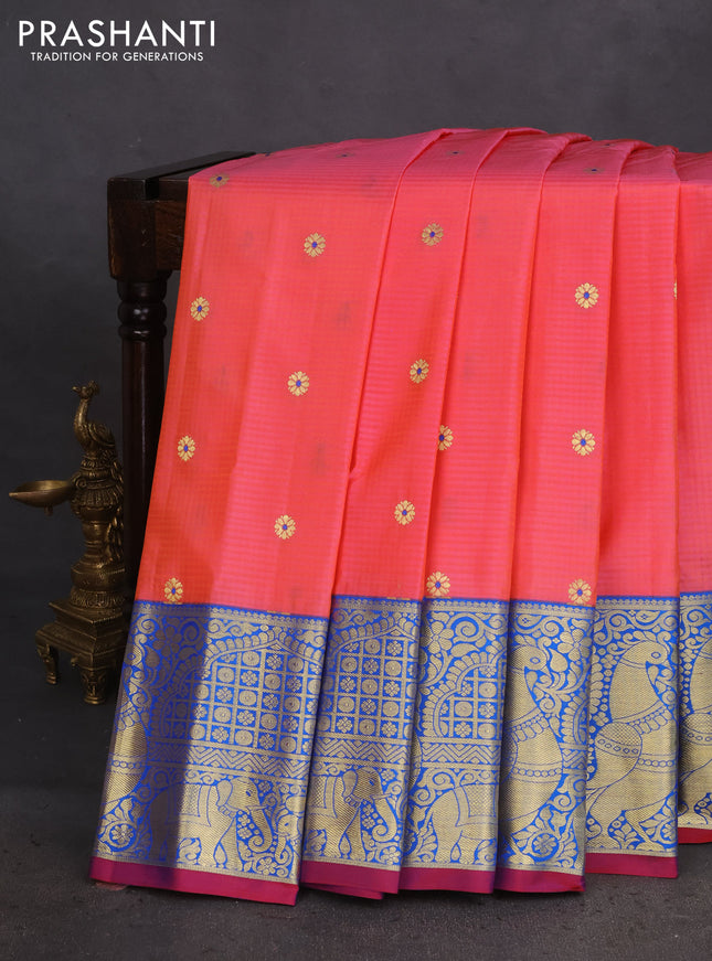 Pure gadwal silk saree peach orange and cs blue with zari woven buttas and long zari woven border