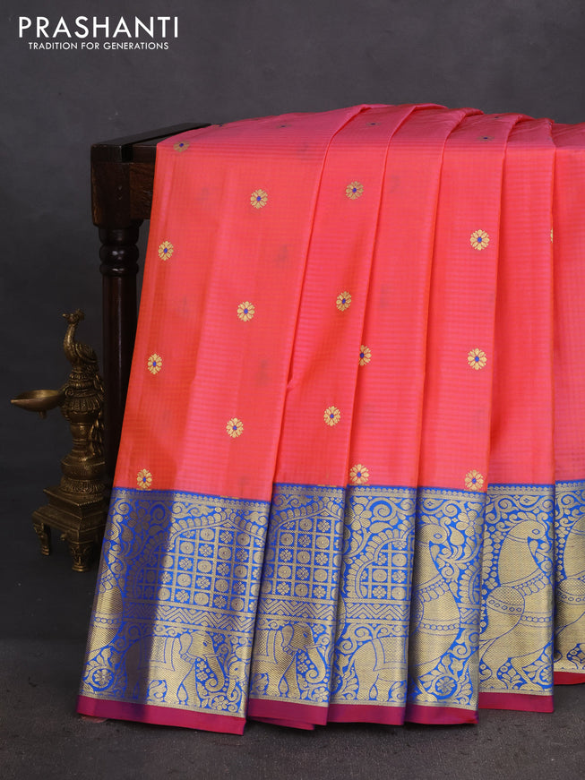 Pure gadwal silk saree peach orange and cs blue with zari woven buttas and long zari woven border