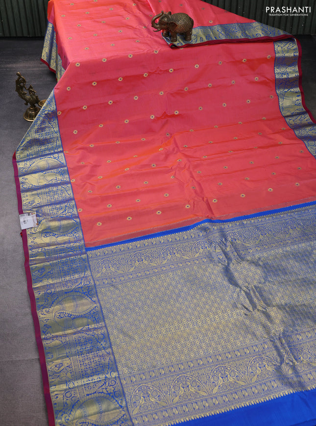 Pure gadwal silk saree peach orange and cs blue with zari woven buttas and long zari woven border