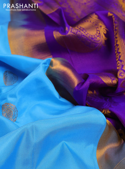 Pure gadwal silk saree light blue and violet with zari woven buttas and temple design zari woven border