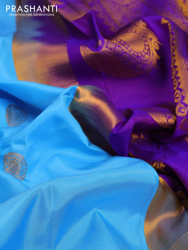 Pure gadwal silk saree light blue and violet with zari woven buttas and temple design zari woven border