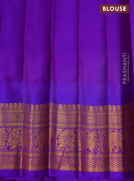 Pure gadwal silk saree light blue and violet with zari woven buttas and temple design zari woven border