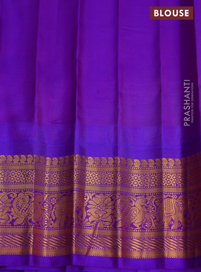 Pure gadwal silk saree light blue and violet with zari woven buttas and temple design zari woven border