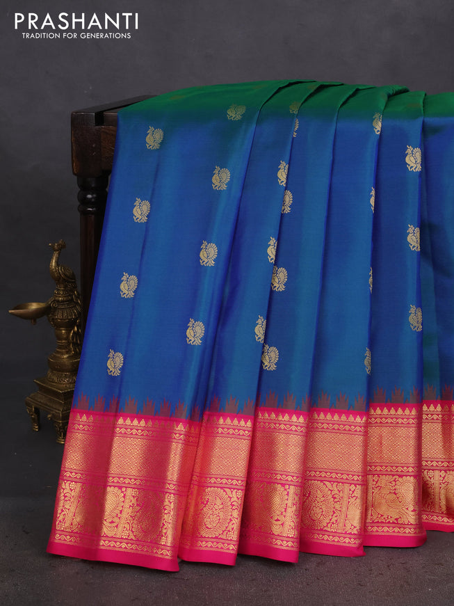 Pure gadwal silk saree dual shade of bluish green and pink with annam zari woven buttas and temple design zari woven border