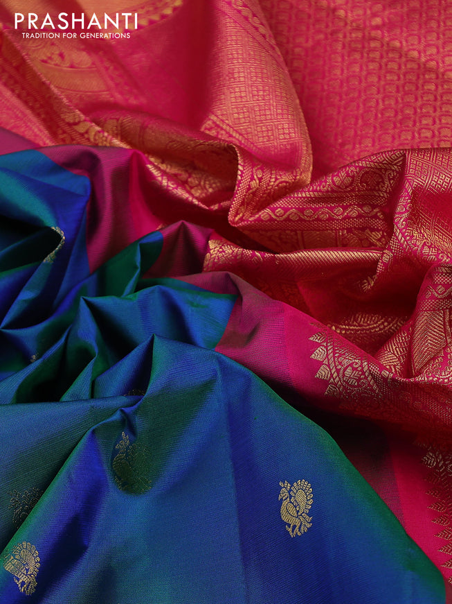 Pure gadwal silk saree dual shade of bluish green and pink with annam zari woven buttas and temple design zari woven border