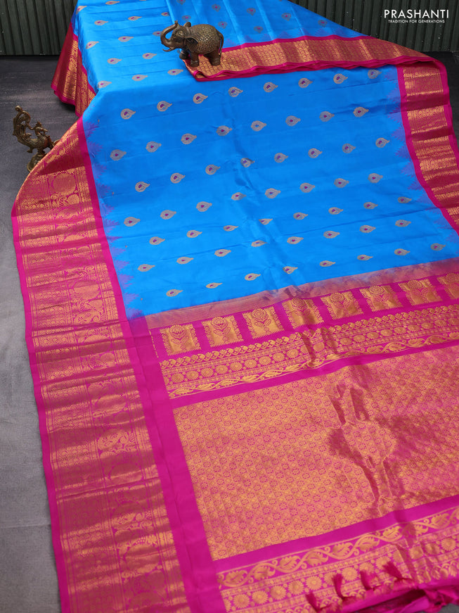 Pure gadwal silk saree cs blue and pink with zari woven buttas and temple design zari woven border