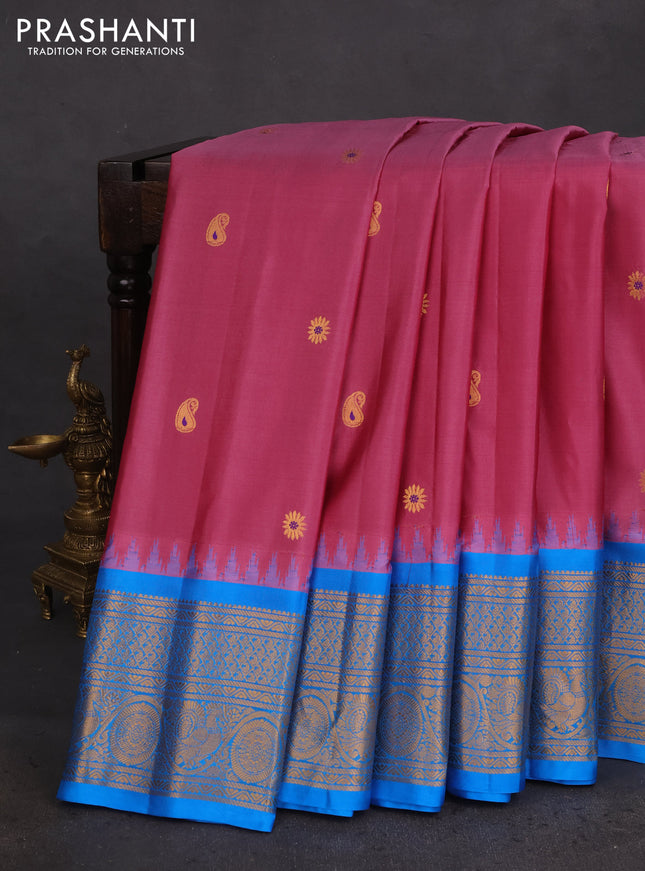 Pure gadwal silk saree mauve pink and cs blue with zari woven buttas and temple design zari woven border