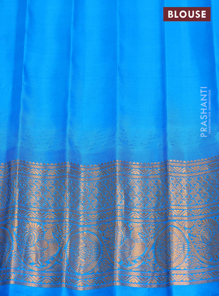 Pure gadwal silk saree mauve pink and cs blue with zari woven buttas and temple design zari woven border
