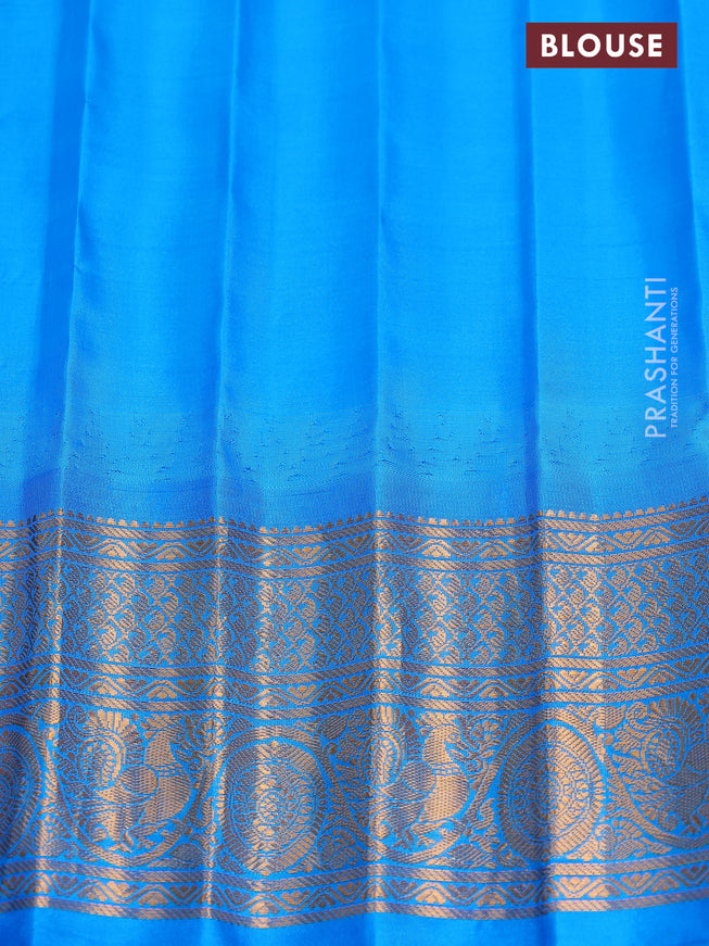 Pure gadwal silk saree mauve pink and cs blue with zari woven buttas and temple design zari woven border