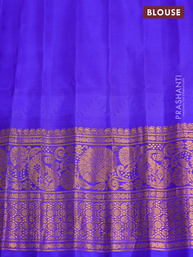 Pure gadwal silk saree red and blue with annam zari woven buttas and long rettapet zari woven border