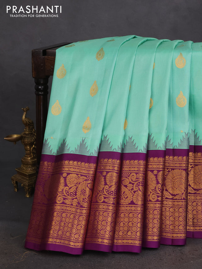 Pure gadwal silk saree pastel green and violet with annam zari woven buttas and long zari woven border