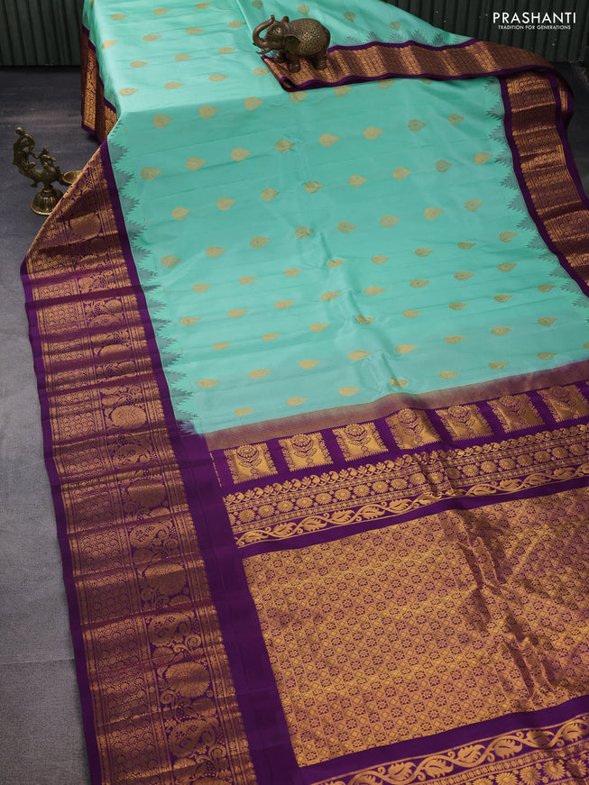Pure gadwal silk saree pastel green and violet with annam zari woven buttas and long zari woven border