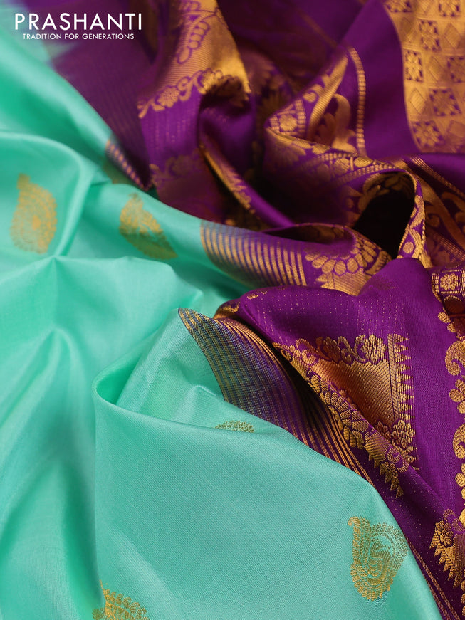 Pure gadwal silk saree pastel green and violet with annam zari woven buttas and long zari woven border
