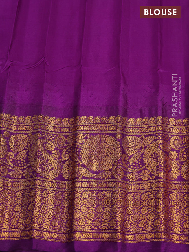 Pure gadwal silk saree pastel green and violet with annam zari woven buttas and long zari woven border