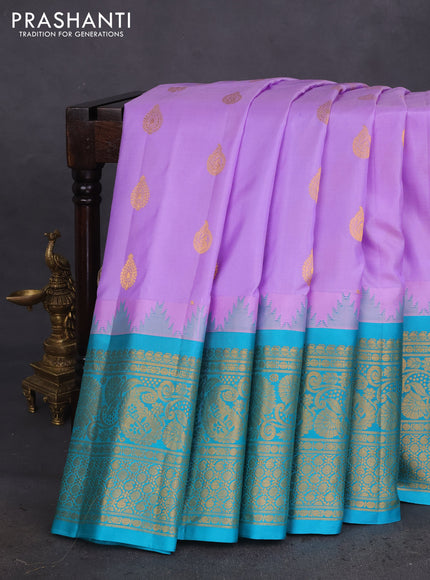 Pure gadwal silk saree lavender shade and teal green with zari woven buttas and temple design zari woven border