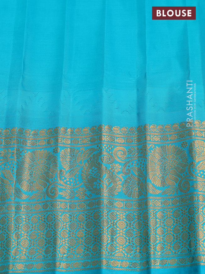 Pure gadwal silk saree lavender shade and teal green with zari woven buttas and temple design zari woven border