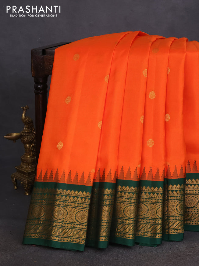 Pure gadwal silk saree orange and green with zari woven buttas and temple design zari woven border