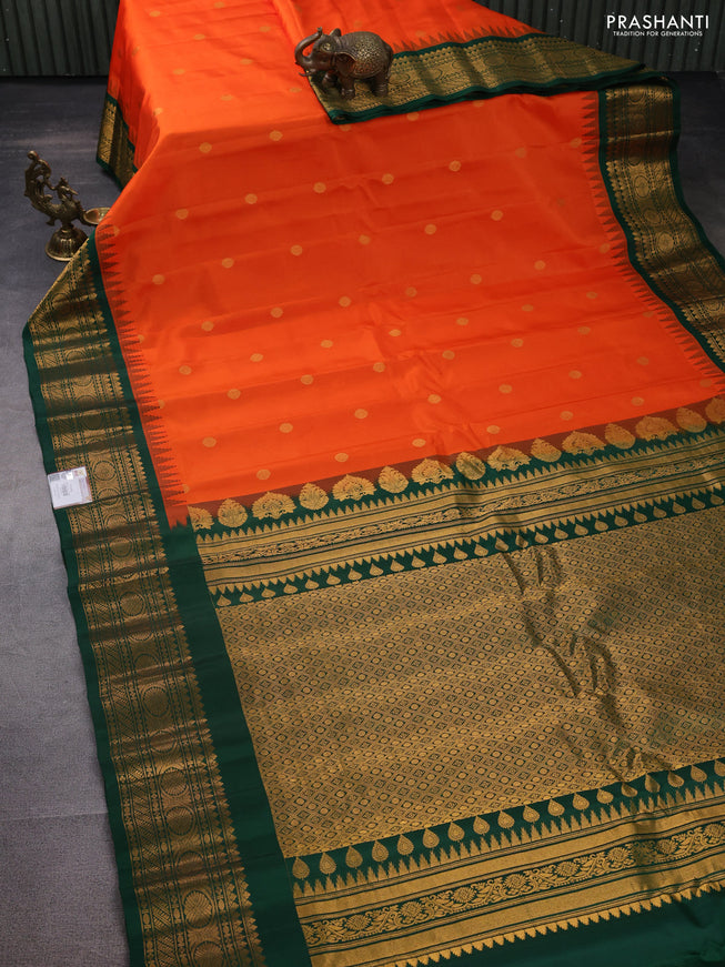 Pure gadwal silk saree orange and green with zari woven buttas and temple design zari woven border